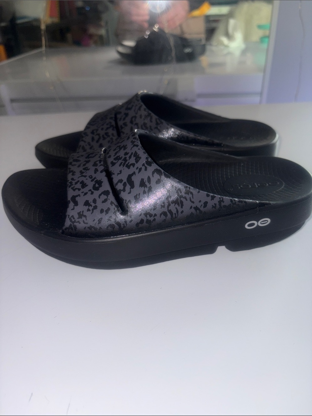 OOFOS Black Slides with Charcoal Leopard Print